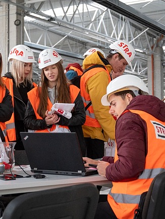 colleague with students within excursion