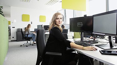 Marija sitting in the office at her desk