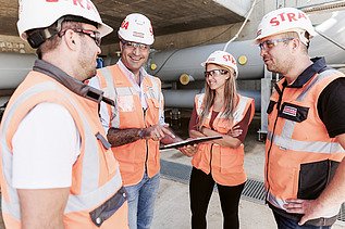 Aykut with his team on the construction site