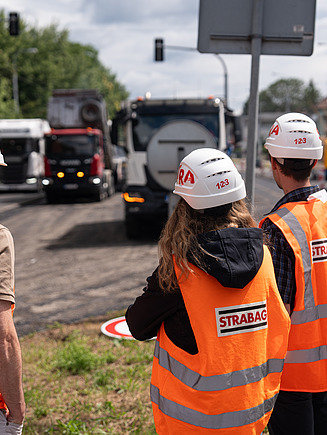 Image of employees at road construction site